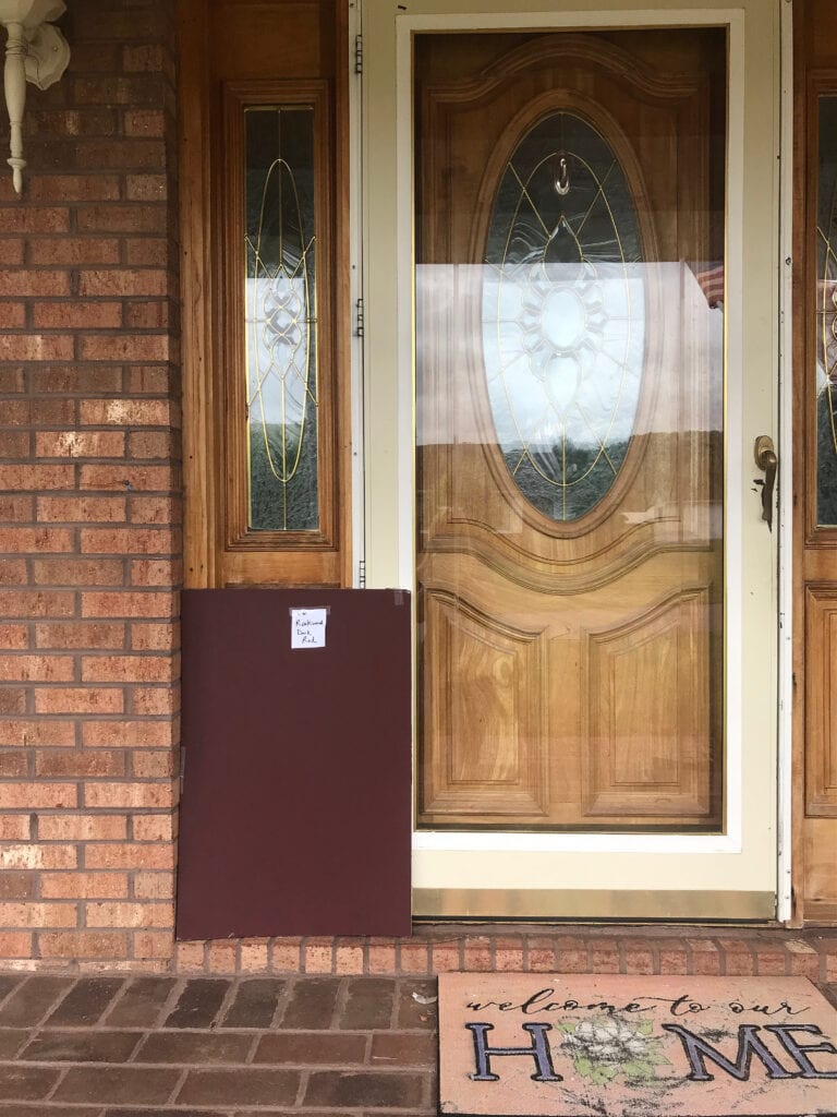 Sherwin Williams Rookwood Dark Red exterior burgundy front door paint color with orange red brick