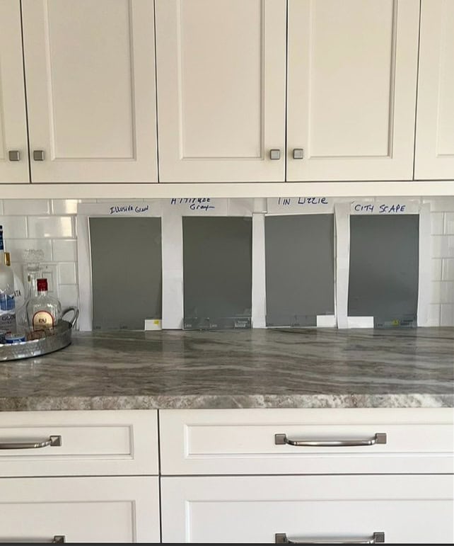 gray-green paint color samples, Samplize, Cafe au lait quartzite gray, brown, off-white, warm white cabinets, Tin Lizzie, Attitude Gray, Illusive Green, Cityscape on subway tile backsplash