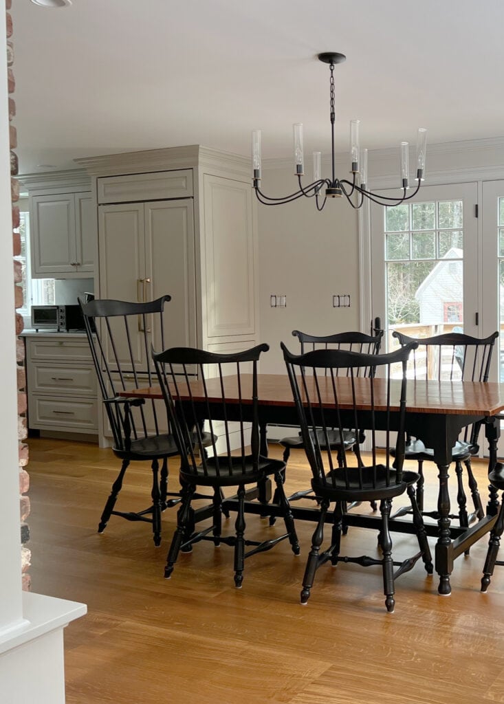 Kitchen cabinets painted Sherwin Williams Accessible Beige, walls Aesthetic White, trim Pure White, wood floor, modern farmhouse style