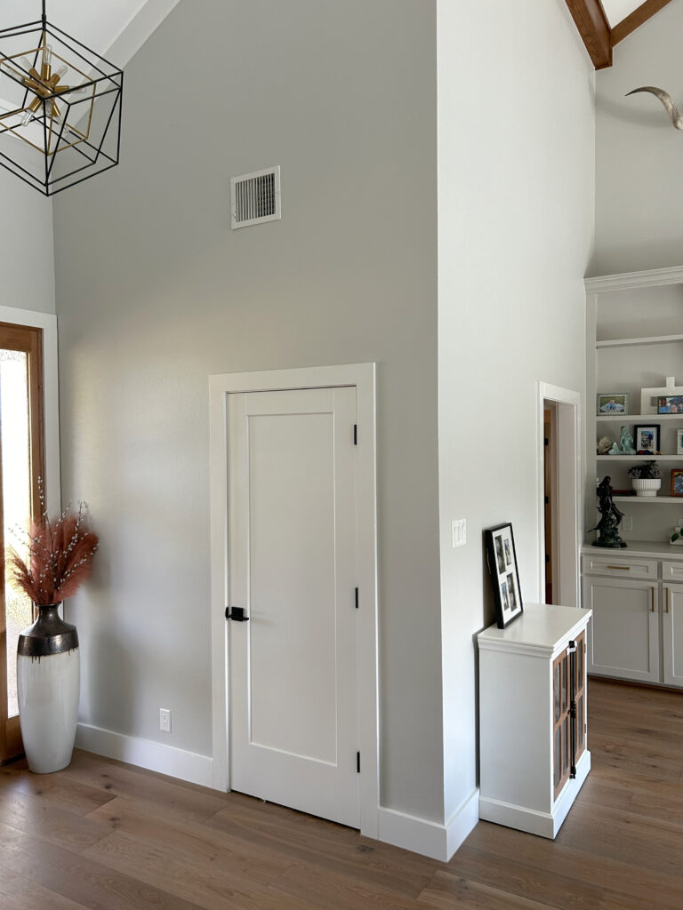 Sherwin Williams Guild Gray, Extra White trim, wood floors, entryway, vaulted ceiling