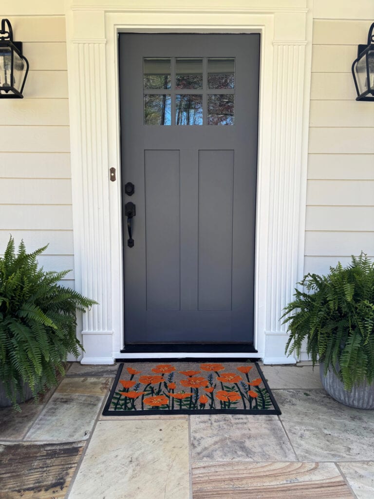 Benjamin Moore Classic Gray, warm off white gray, Sherwin Williams White Snow trim, Charcoal Slate painted front door, black hardware