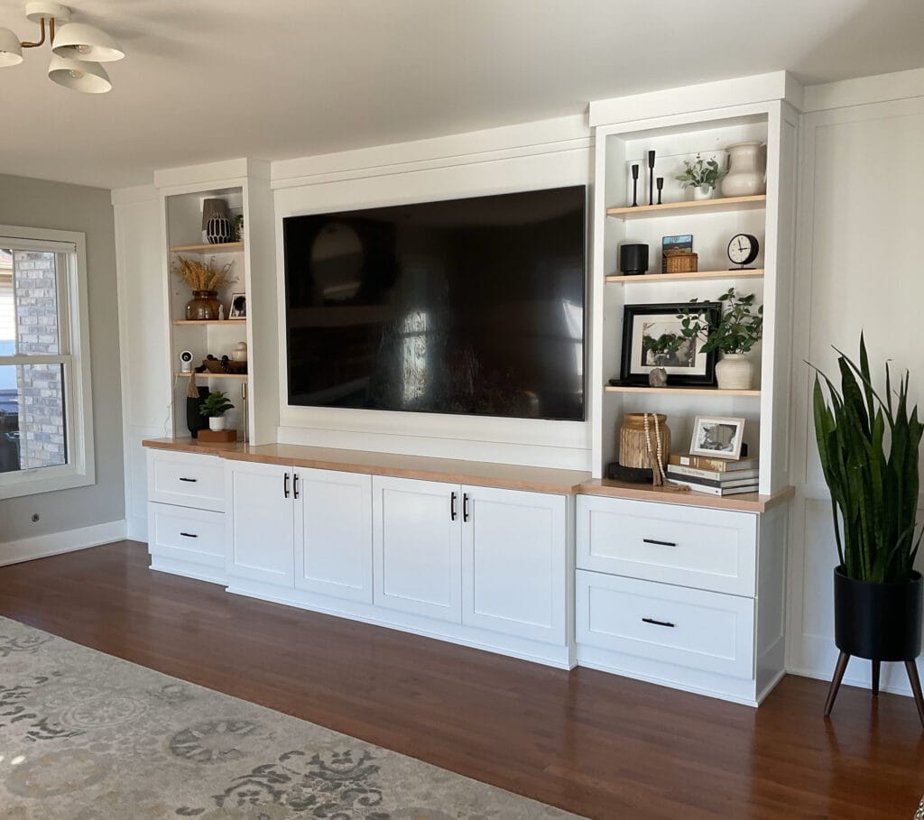 Built-in bookcase, shelves, cabinets with TV, home decor, Sherwin Williams Extra White cabinets and trims, Agreeable Gray wall, red oak floor (1)