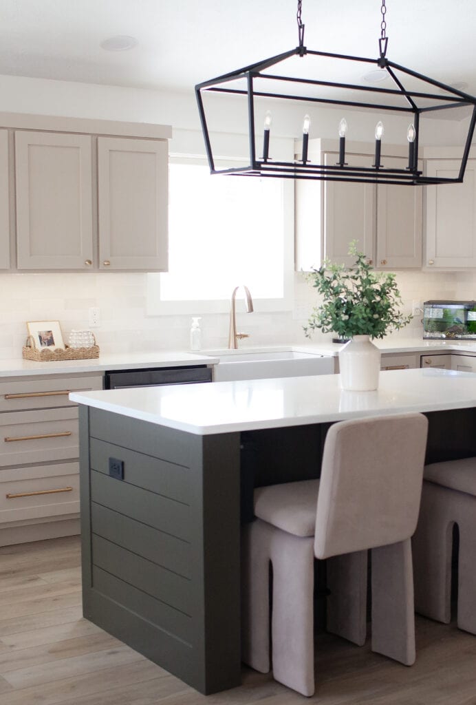 Kitchen painted oak cabinets, LVP floor, Sherwin Williams Porpoise painted island with shiplap, white quartz, Balanced Beige cabinets, zellige tile backsplash, gold hardware