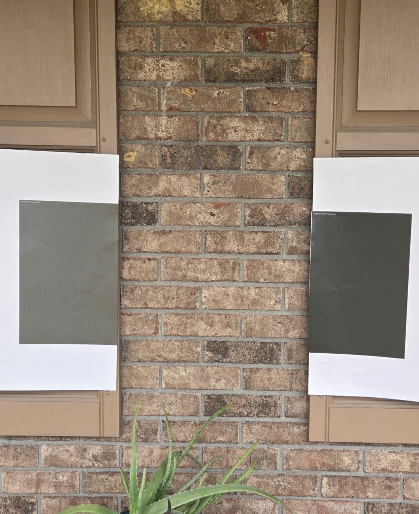 Orange exterior brick with beige, pink, brown, Sherwin Williams soft greige and stronger green greige for shutter colors. Beige, almond tan windows