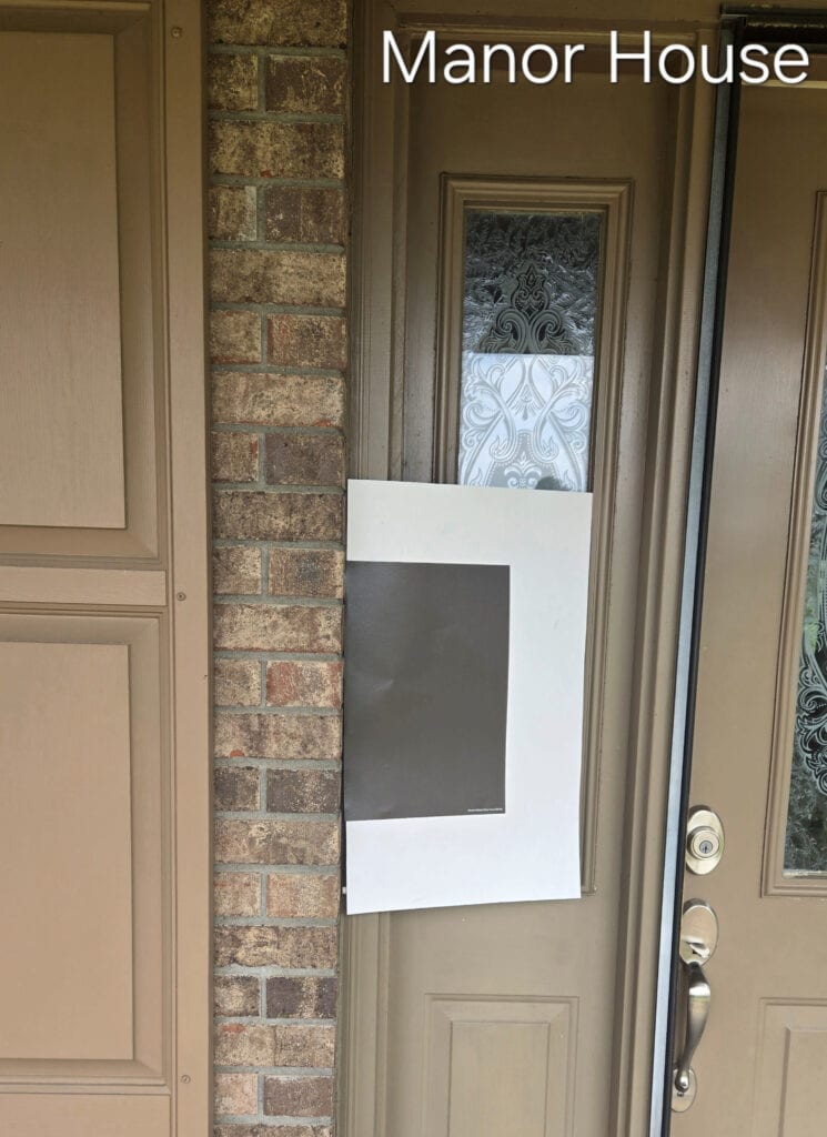 Sherwin Williams Manor House dark brown-gray-taupe paint color with exterior brick in beige, brown, peach and orange hues