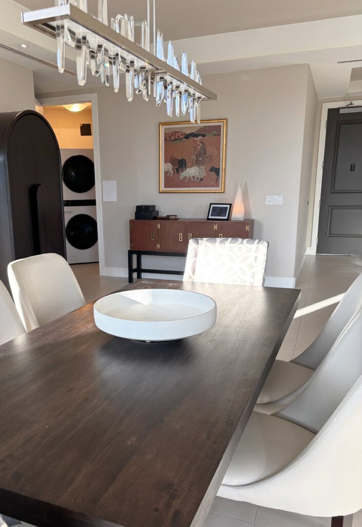 Sherwin Williams Natural Tan, Benjamin Moore Simply White trim, dark wood espresso dining table in diningroom, traditional formal, beige taupe tile floor