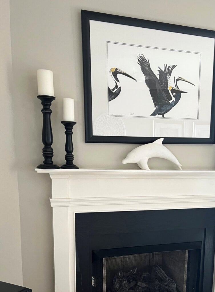 Benjamin Moore Revere Pewter, warm gray greige with White Dove trim, mantel, black decor and fireplace tile surround