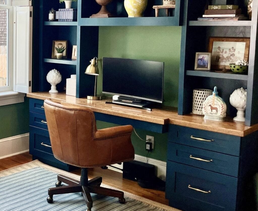 Farrow and Ball Hague Blue, best dark blue paint color with Calke Green on walls, home decor and brown leather office chair
