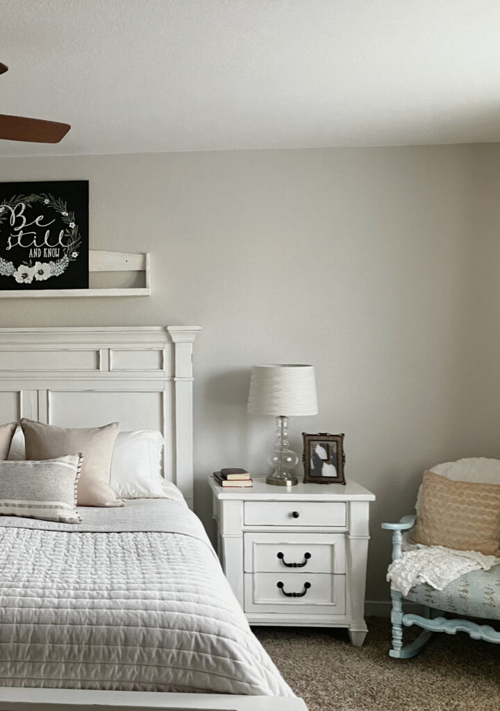 Bedroom with Sherwin Williams Egret White and off-white cremay painted bedroom furniture