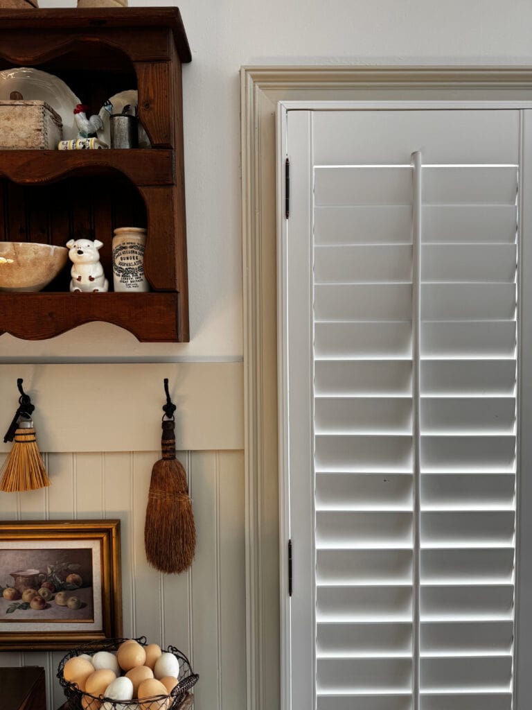 Sherwin Williams Snowbound soft white, white shutters, Accessible Beige painted beadboard and trim, antique vintage home decor in kitchen