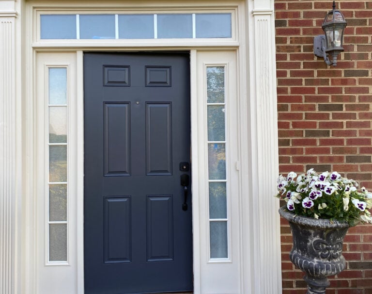 Colonial style red brick home with cr