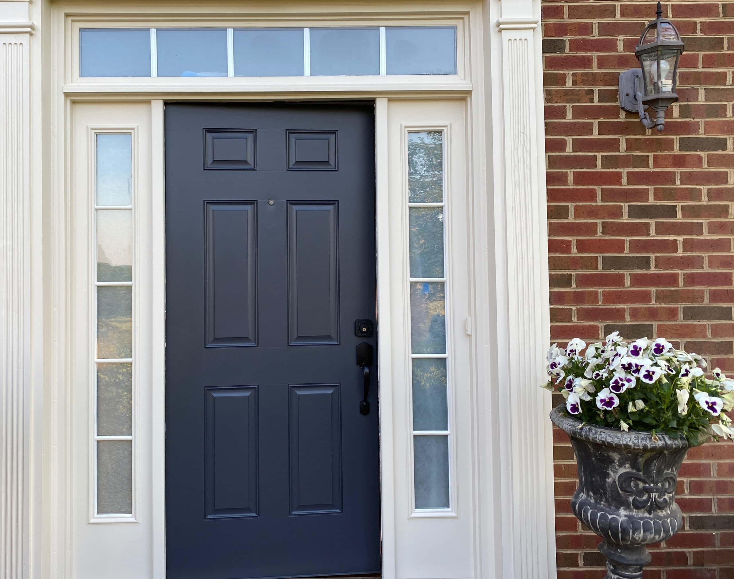Colonial style red brick home with cr