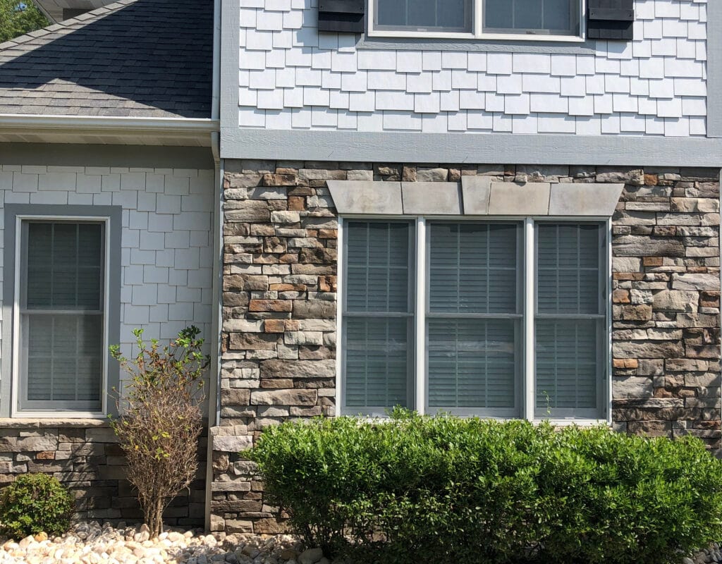 Exterior before Agreeable GRay witih stone