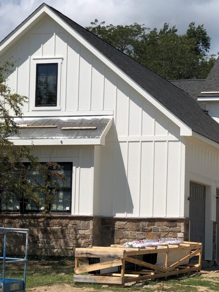Exterior with brick and Sherwin Williams Greek Villa warm white paint colour. CLIENT PHOTO Kylie M INteriors edesign (1)