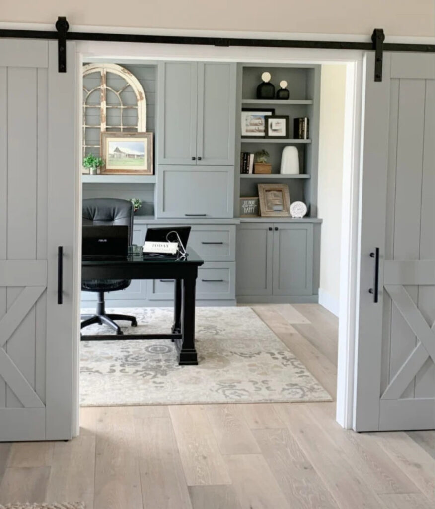 Home office painted Magnolia Teak Cups with Clutch sliding doors. Grray cabinets with white-washed wood flooring