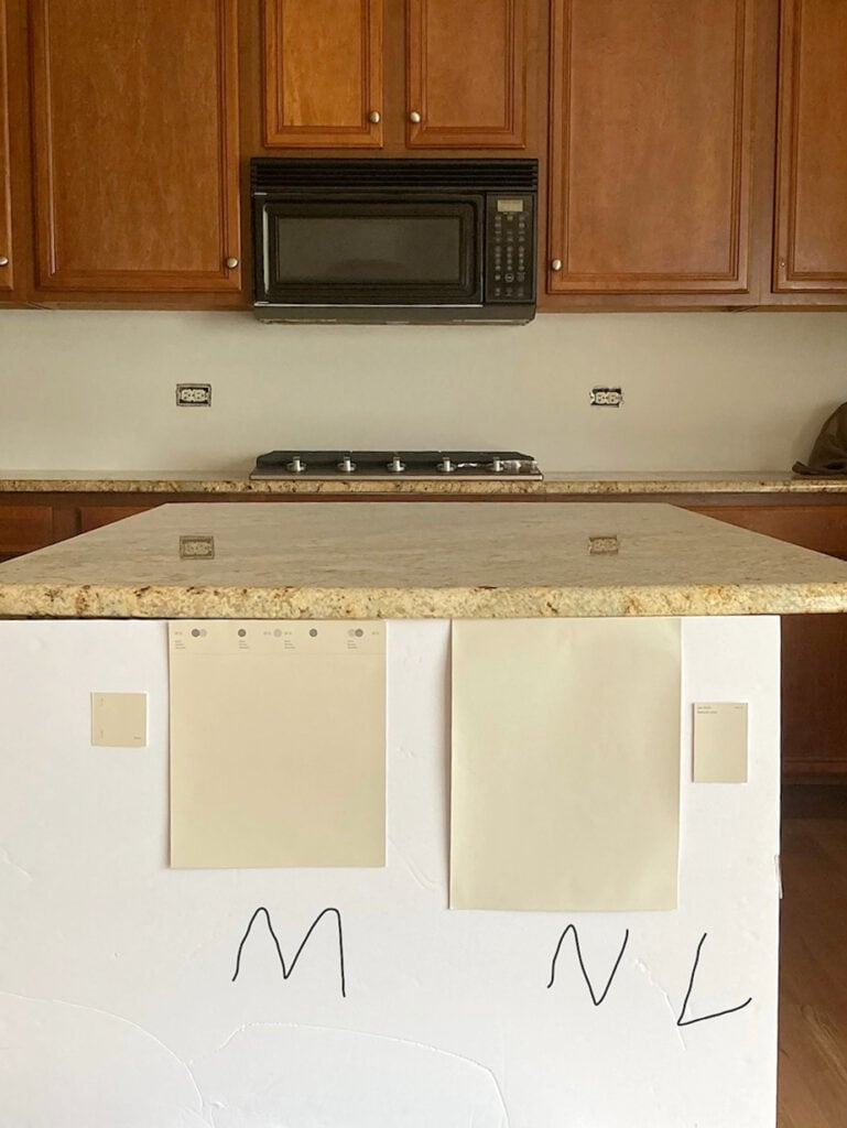 Benjamin Moore Muslin compared to Natural LInen with gold beige yellow granite countertop